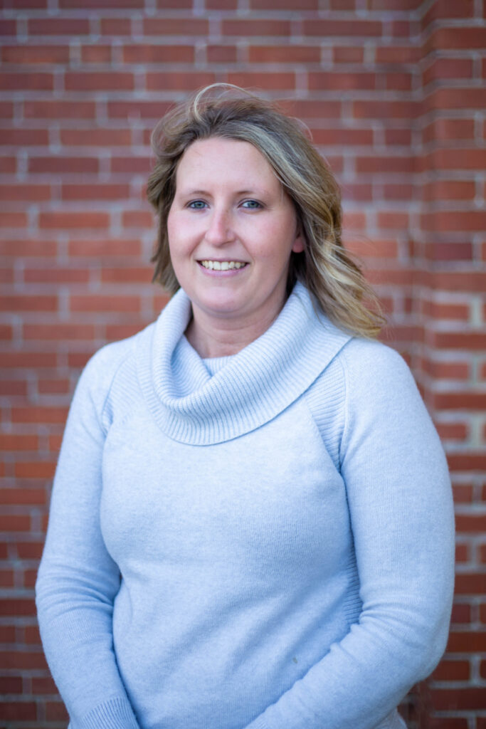 Woman smiling in sweater