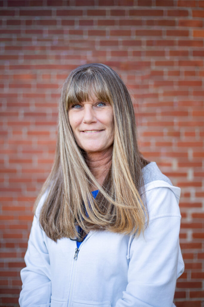 Woman smiles at camera