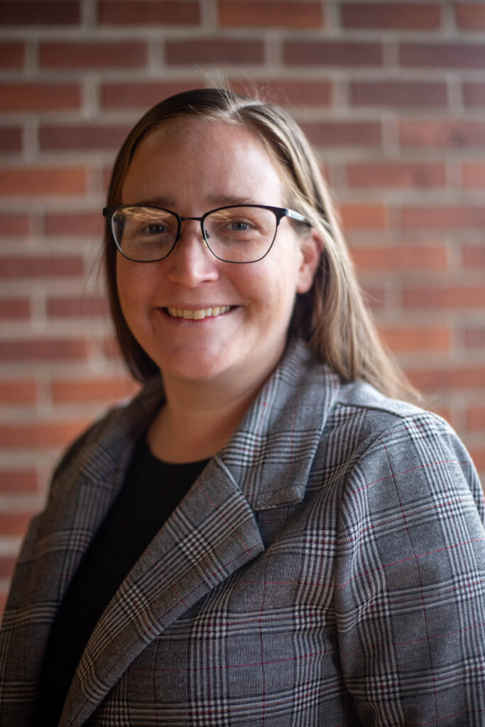 Woman in glasses smiling