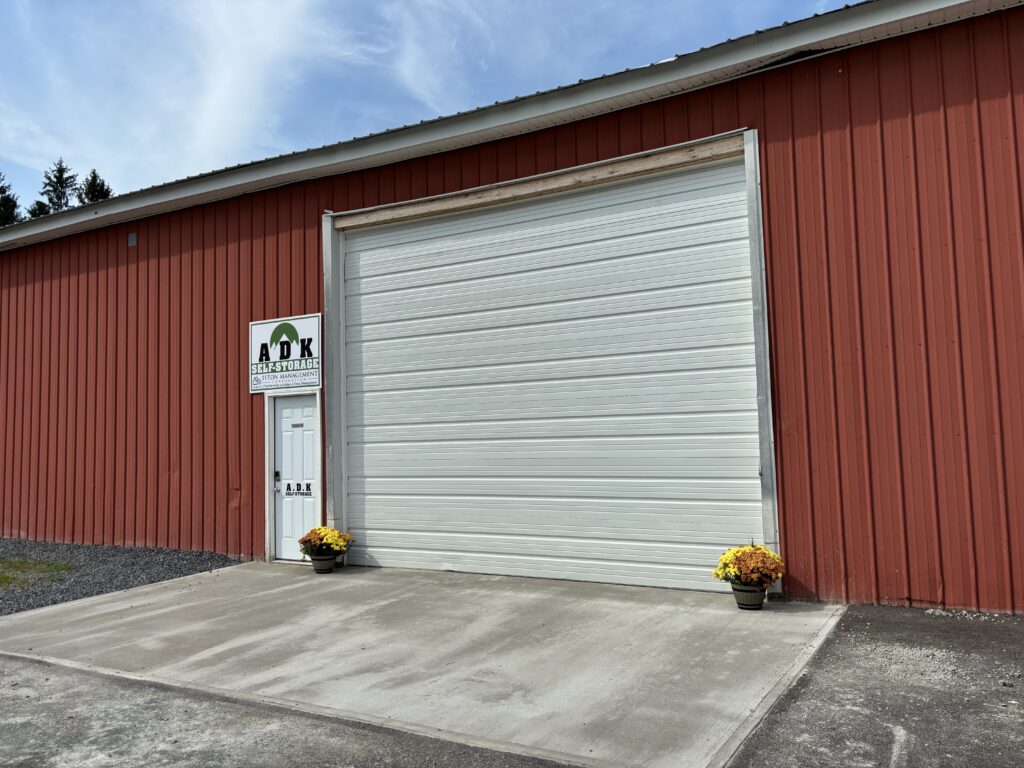 Red building with garage door